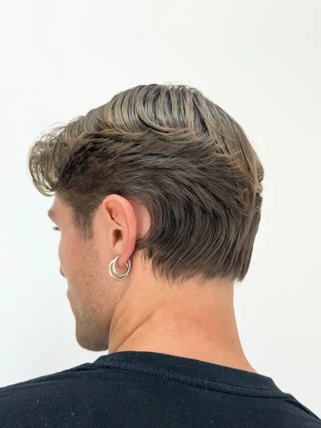 Longer layered men's haircut finished at Antisystem Barbershop, Bondi Beach